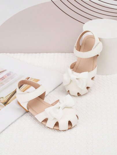 1 par de Zapatos planos huecos con cierre de gancho y bucle con diseño de lazo para bebé niña, adecuados para primavera y verano