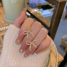 1雙女性閃閃發光的滿鋯十字綁結耳釘,適用於婚禮、派對、日常穿戴 - 金色 - 查看 4