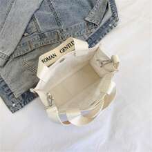 1個塗鴉藝術帆布袋,2024四季簡約休閑斜挎手提袋,百搭時尚日常通勤手提包,富有藝術感的學校用品,適合女性日常外出、通勤和上學使用。 - 白色 - 查看 4