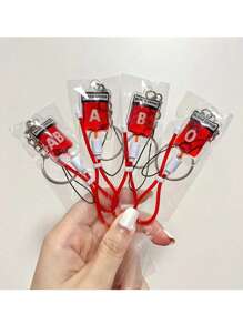 1個等離子血袋鑰匙扣手機吊飾,萬聖節字母血袋手袋吊飾,鑰匙吊飾,特別適合萬聖節現場（a型血） - 彩色 - 查看 1