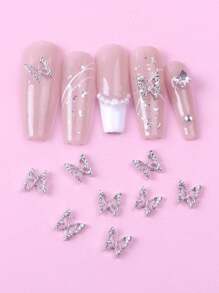 10 piezas Decoración de arte de uñas con diseño de mariposa de rhinestone plateado, Dijes, Gemas y Suministros para uñas