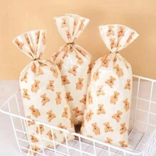 Set de 50 piezas/100 piezas Bolsas de plástico para empacar regalos de dulces de oso, galletas, postres, suministros de decoración para fiesta de cumpleaños, baby shower