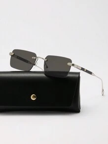 Lentes grises con montura plateada.