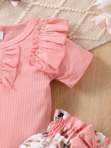 Bộ áo liền quần tay ngắn màu hồng chấm bi viền bèo nhún cho bé gái, kèm băng đô và quần in hoa. - Hồng - Xem 5