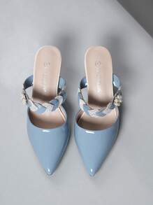 Tacones altos de stiletto de punta afilada y escote bajo para mujer