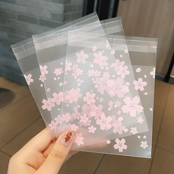 100pcs/Pack Sakura Flower Frosted Semi-Transparent Ziplock Storage Bags, Random Pattern, Jewelry Organizer, Holiday Party Supplies, Useful Small Business Accessory, Gift Bags Valentines