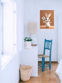 這幅逼真現代的掛畫印刷品展現了一隻像皮克斯風格渲染的白兔,手持一個標誌寫著'hello World',並配有暈光效果和時尚的蓬鬆頭髮。這是一款時尚和獨特的裝飾品,適用於任何房間,包括客廳、臥室和浴室。 無框的裝飾印刷品。 - 彩色 - 查看 3