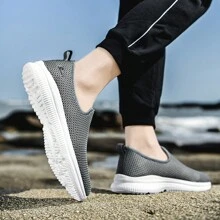 Zapatillas deportivas casuales para hombres con estilo nuevo de primavera/verano, zapatos cómodos de hombre sin cordones y livianos con acabado informal y transpirable - Gris - Ver 4