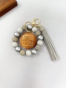 1入女士條紋木珠鑰匙扣,附有“mama”字母刻印的木片吊飾流蘇手環鑰匙扣,可用於包包配飾珠寶掛件,是給媽媽的完美禮物。 - 條紋 - 查看 7