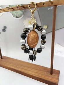 1入女士條紋木珠鑰匙扣,附有“mama”字母刻印的木片吊飾流蘇手環鑰匙扣,可用於包包配飾珠寶掛件,是給媽媽的完美禮物。 - 條紋 - 查看 15