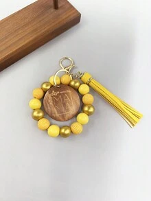 1入女士條紋木珠鑰匙扣,附有“mama”字母刻印的木片吊飾流蘇手環鑰匙扣,可用於包包配飾珠寶掛件,是給媽媽的完美禮物。 - 條紋 - 查看 6