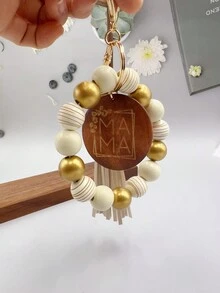 1入女士條紋木珠鑰匙扣,附有“mama”字母刻印的木片吊飾流蘇手環鑰匙扣,可用於包包配飾珠寶掛件,是給媽媽的完美禮物。 - 條紋 - 查看 14