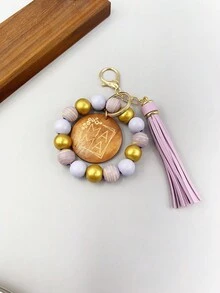 1入女士條紋木珠鑰匙扣,附有“mama”字母刻印的木片吊飾流蘇手環鑰匙扣,可用於包包配飾珠寶掛件,是給媽媽的完美禮物。 - 條紋 - 查看 10