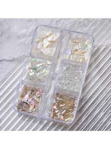 1 boîte de set d'art pour ongles avec coquillages de tailles mixtes, 6 différentes tailles d'éclats de coquillages pour différents designs d'ongles, incluant des formes asymétriques et des morceaux de coquille d'ormeau colorés. Charms pour ongles, pierres décoratives pour ongles, fournitures pour ongles DIY