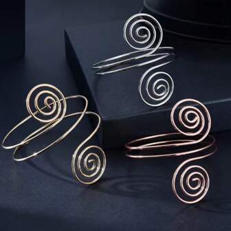 1 件热销跨境朋克重金属螺旋音符形夸张个性臂环，适合女性日常佩戴