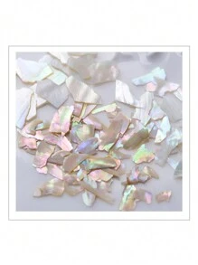1 boîte de set d'art pour ongles avec coquillages de tailles mixtes, 6 différentes tailles d'éclats de coquillages pour différents designs d'ongles, incluant des formes asymétriques et des morceaux de coquille d'ormeau colorés. Charms pour ongles, pierres décoratives pour ongles, fournitures pour ongles DIY