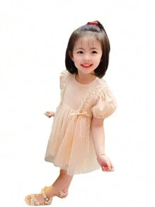 Letnia sukienka w jednolitym kolorze z siateczki dla młodych dziewcząt, z bufiastymi rękawami