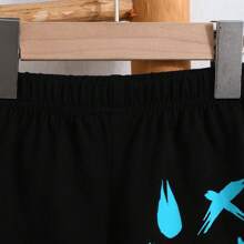 Young Boy Summer Set: Sleeveless Expression Printed Vest And Shorts