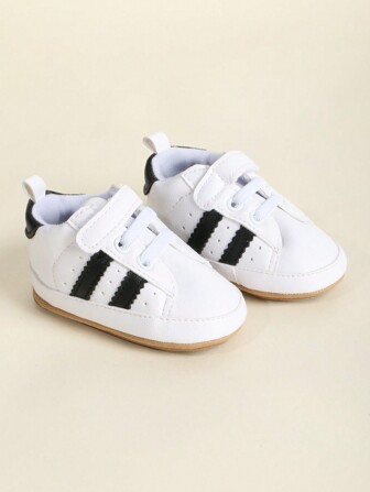 1雙男孩色塊pu鈎環閉合扁平休閒運動鞋配橡膠大底,適用於春季和秋季