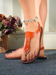 Sandales plates à enfiler pour femmes avec rivets élastiques, bout rond, à découpe ajourée, ouvertes, confortables et antidérapantes pour l'extérieur