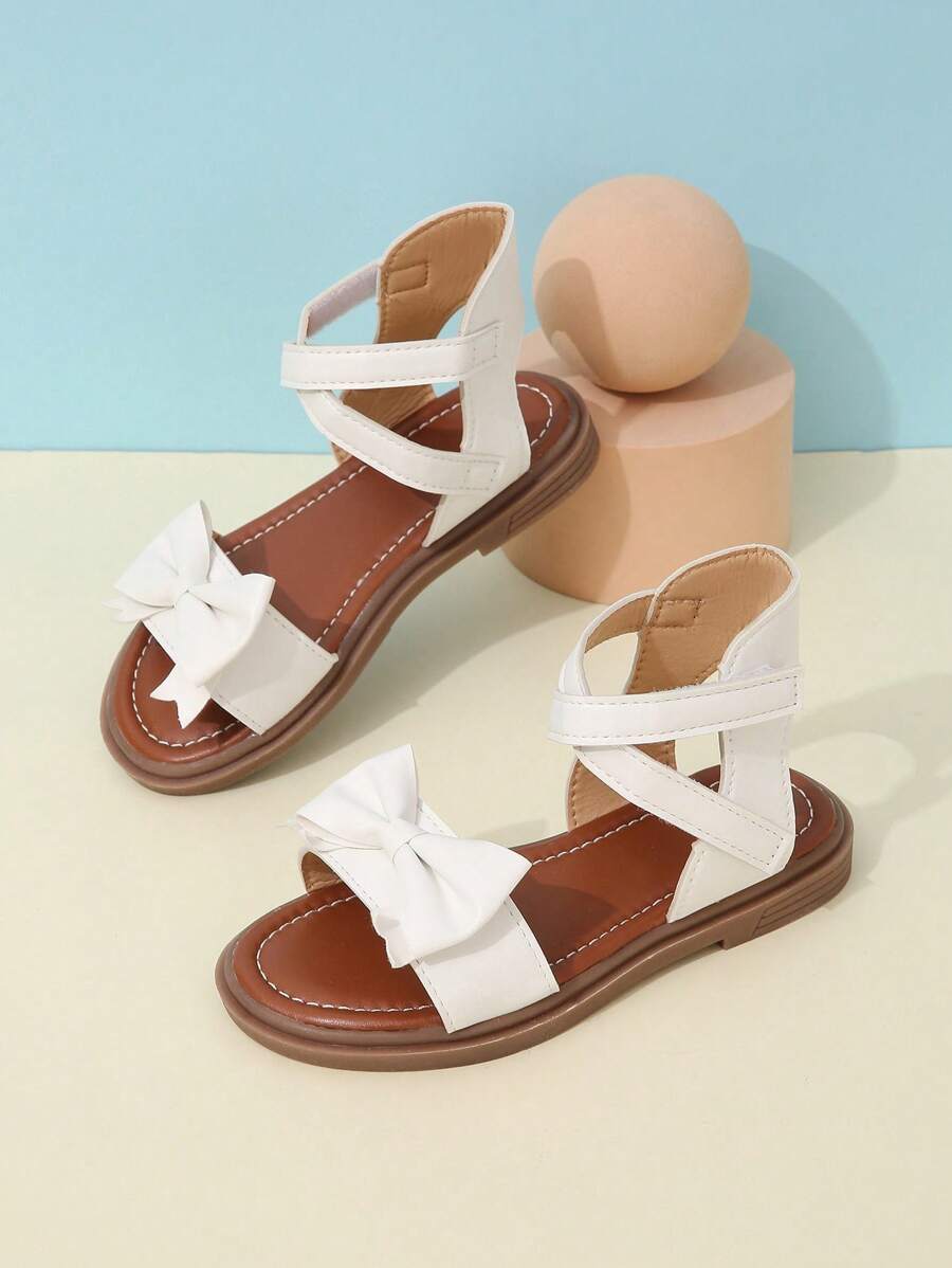 1pair Girls' Bowknot Cutout Pu Strap Roman Sandals With Flat Heels For Summer