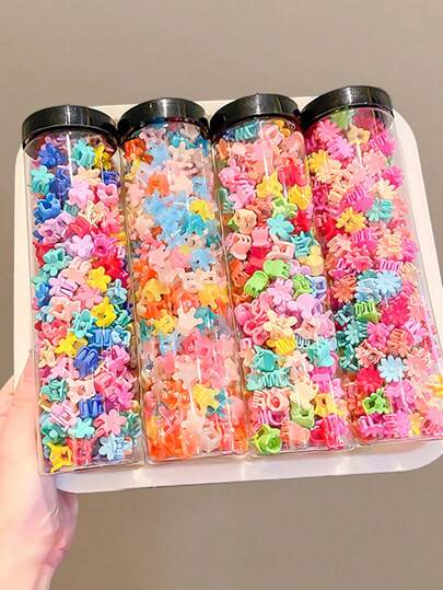 Set de 80 piezas de pasadores de pelo para niñas con diseños de estrellas, coronas, flores, orejas de conejo y margaritas en colores variados, accesorios de pelo adecuados para uso diario