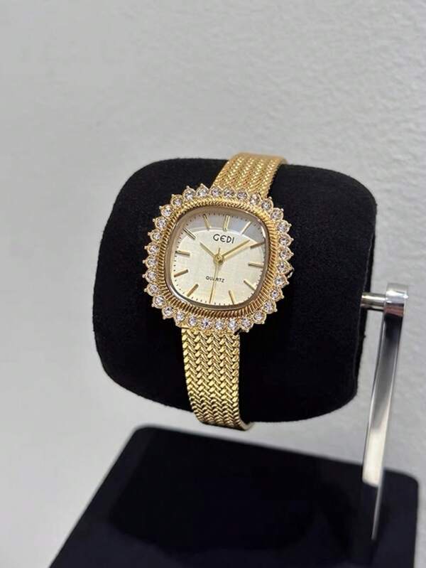 ساعة نسائية بسيطة من الفولاذ المقاوم للصدأ مزينة بحجر راينستون، وجه ساعة مربع مع مشبك