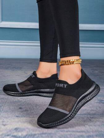 時尚流行的女性休閒鞋：網面易穿軟壓底船鞋,高彈力柔軟襪套鞋,中空設計,適用於家居、辦公室或通勤。 黑色。