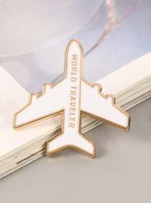 1個時尚的飛機模型金屬胸針,上面寫有英文單詞'world Traveler',多功能裝飾衣服和袋子的針章