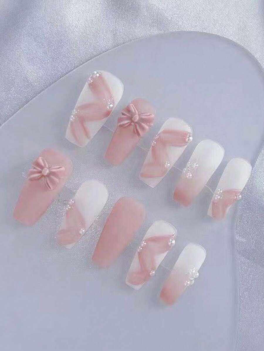 Conjunto de 10 uñas postizas bellamente hechas a mano con lazos rosa en ...