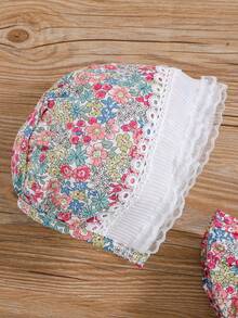 Completo neonata estivo con body floreale a pois e decorazione nodo, con cappello coordinato