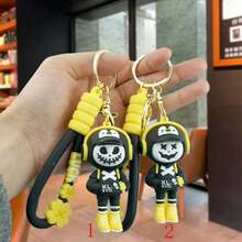 1 pièce Porte-clés de poupée en caoutchouc souple PVC avec visage de dessin animé mignon unisexe. Idées de cadeaux pour fête, anniversaire, Halloween, Noël. Accessoires de sac, porte-badges, accessoires de voiture.