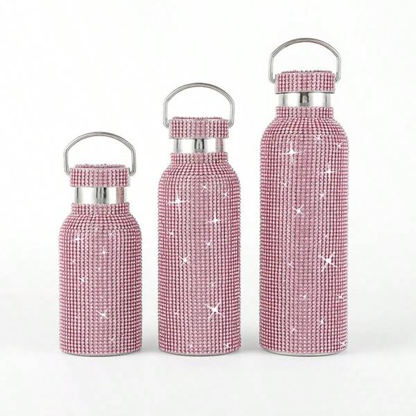 A Pink Rhinestone Coated Bottle In 350ml, 500ml, And 750ml With Stainless Steel Strap. Available In Various Capacities & Handmade With Rhinestone. Suitable For Traveling, Outdoor, Home Use, Sports And As Gifts. Water Bottle Back To School