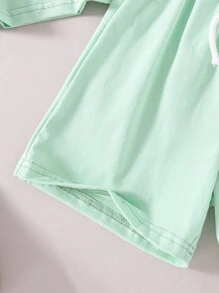 Camiseta de manga corta y pantalones cortos para niño casual con cuello redondo tejido con letra grabada