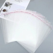 100 piezas Bolsas de empaque OPP transparentes, para empacar libros, decoraciones, papelería, regalos, abarrotes, etc. Bolsas a prueba de polvo y humedad, vuelta a la escuela Día de San Valentín