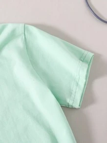 Camiseta de manga corta y pantalones cortos para niño casual con cuello redondo tejido con letra grabada