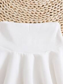Young Girl Solid Colored Vest And Skirt Set