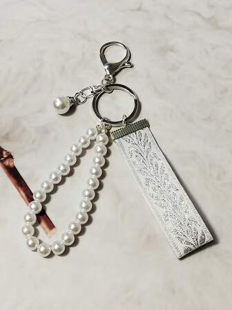 1 pieza Llavero de imitación de perlas con llavero de hoja plateada y llavero jacquard para mujer, colgante para bolso exquisito, llavero de cinta de moda para mujer, llavero universal de moda para mujeres, útiles escolares, regalos para maestros, accesorios para maestros al regresar a la escuela