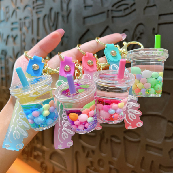 1 pieza Llavero creativo con forma de té de burbujas con arena líquida en el interior, un colgante exquisito y adorable para parejas, bolsas, ropa y computadoras portátiles, regalo de Halloween, recuerdo, accesorio de coche, dije para bolso, mochila para la escuela