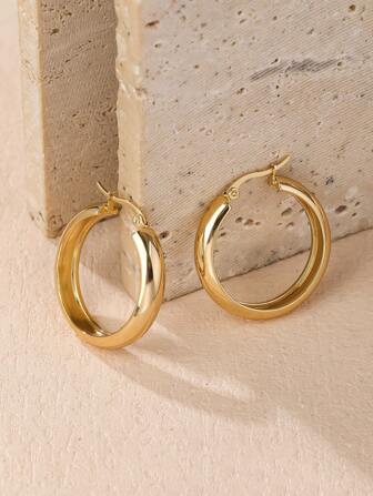 A Pair Of Simple, Fashionable And Popular Stainless Steel Hoop Earrings Suitable For Daily Wear By Women