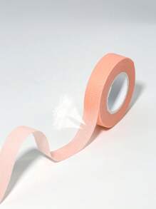 1 pièce Ruban adhésif pour extension de cils en tissu non tissé rose, sans peluche, respirable, ruban en papier de 9 m de long
