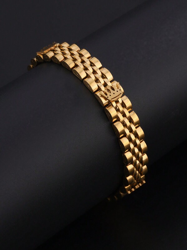 Un semplice e alla moda braccialetto con tre corone in acciaio inossidabile color oro