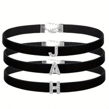 Schwarzes Halsband Aus Strassbesetzten Buchstaben Und Aufgenähtem Band Mit Strasssteinen