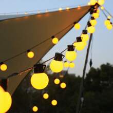 A String Of LED Bulb Lights, G50 Bulb Lights, White Plastic Ball Bulb Lights, Suitable For Outdoor Camping, Picnic, Tent Decoration, Ambience Lighting, Wedding Decoration, 5-Meter-Long Light String With 20 Lights Heads, Using 3 AA Battery Box And USB Dual-Use Style (Excluding Battery), And 5-Meter-Long Light String With 20 Lights Heads, Using Solar Power Supply Style (Including Two Accessories); 10-Meter-Long Light String With 40 Lights Heads, Using 3AA Battery Box And USB Dual-Use Style (Excluding Battery), And 10-Meter-Long Light String With 40 Lights Heads, Using Solar Power Supply Style (Including Two Accessories); Ball Bulb Size 5cm.