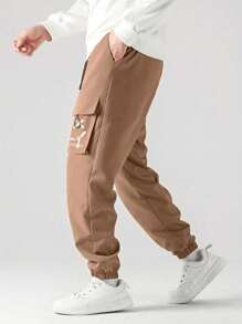 Pantalones de carga casuales con cordón en la cintura y estampado sonriente, de moda para niño preadolescente para la temporada de regreso a la escuela