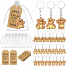 12-częściowy zestaw upominkowy na baby shower z misiem, uroczy brelok z misiem w przezroczystej siateczkowej torbie, etykieta z papieru typu kraft z podziękowaniami i sznurek, odpowiedni dla gości, dziewcząt i chłopców, artykuły dekoracyjne na przyjęcie urodzinowe (różowy, uroczy), Boże Narodzenie