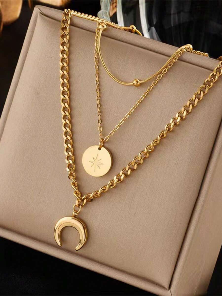 Multilayered necklace with star and moon pendants, elegant and stylish stainless steel necklace - Yellow Gold - View 1