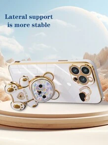 这款手机壳饰有彩虹糖熊图案，采用电镀工艺，DIY设计，心形造型，防震耐用。手机壳包含电镀隐藏式支架和全套配件，兼容苹果11/12/13/14/15 Pro Max、三星S22/23/24、UA04/A05/A14/A15/A24/A25/A34/A54S、小米、OPPO、vivo Redmi 13c等机型。此为国际版，非国内版。 - 白色 - 查看 2