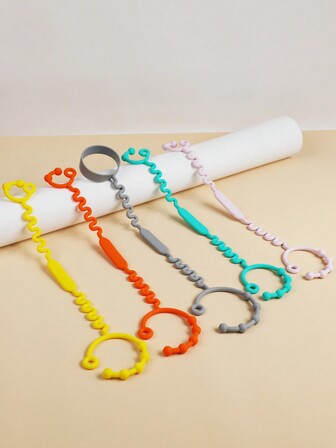 5件/套汽车安全座椅硅胶系绳，4件汽车安全座椅玩具系绳，1件汽车安全座椅奶瓶系绳，采用硅胶材质，防止玩具和奶瓶散落，适用于汽车婴儿安全座椅。