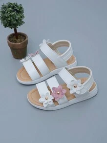 Nuovi sandali classici alla romana per bebè e ragazze, con fiore a sei petali in rilievo, disponibili in 3 colori, suola morbida antiscivolo con chiusura a strappo facile, sandali da principessa in pelle per prescolari. Nota: il motivo laterale sulla suola può variare leggermente tra le taglie [21-25, 26-29]